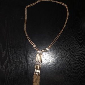 Long hanging necklace by Charming Charlie